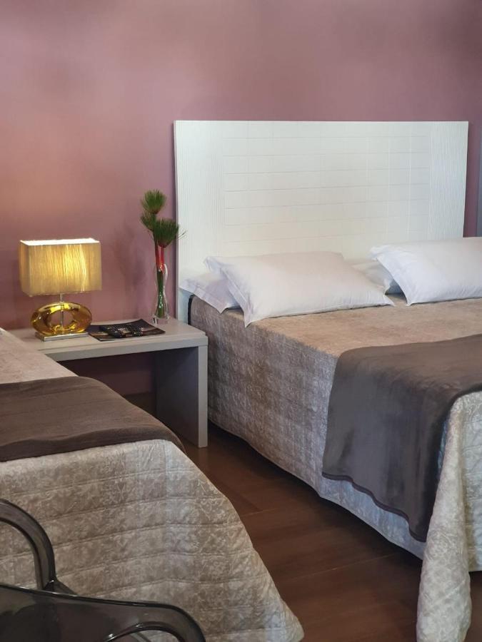 Quarto Triplo com Varanda
