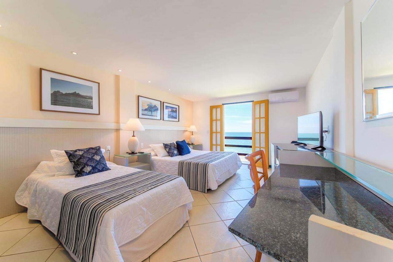 Quarto Triplo Deluxe com Vista Mar