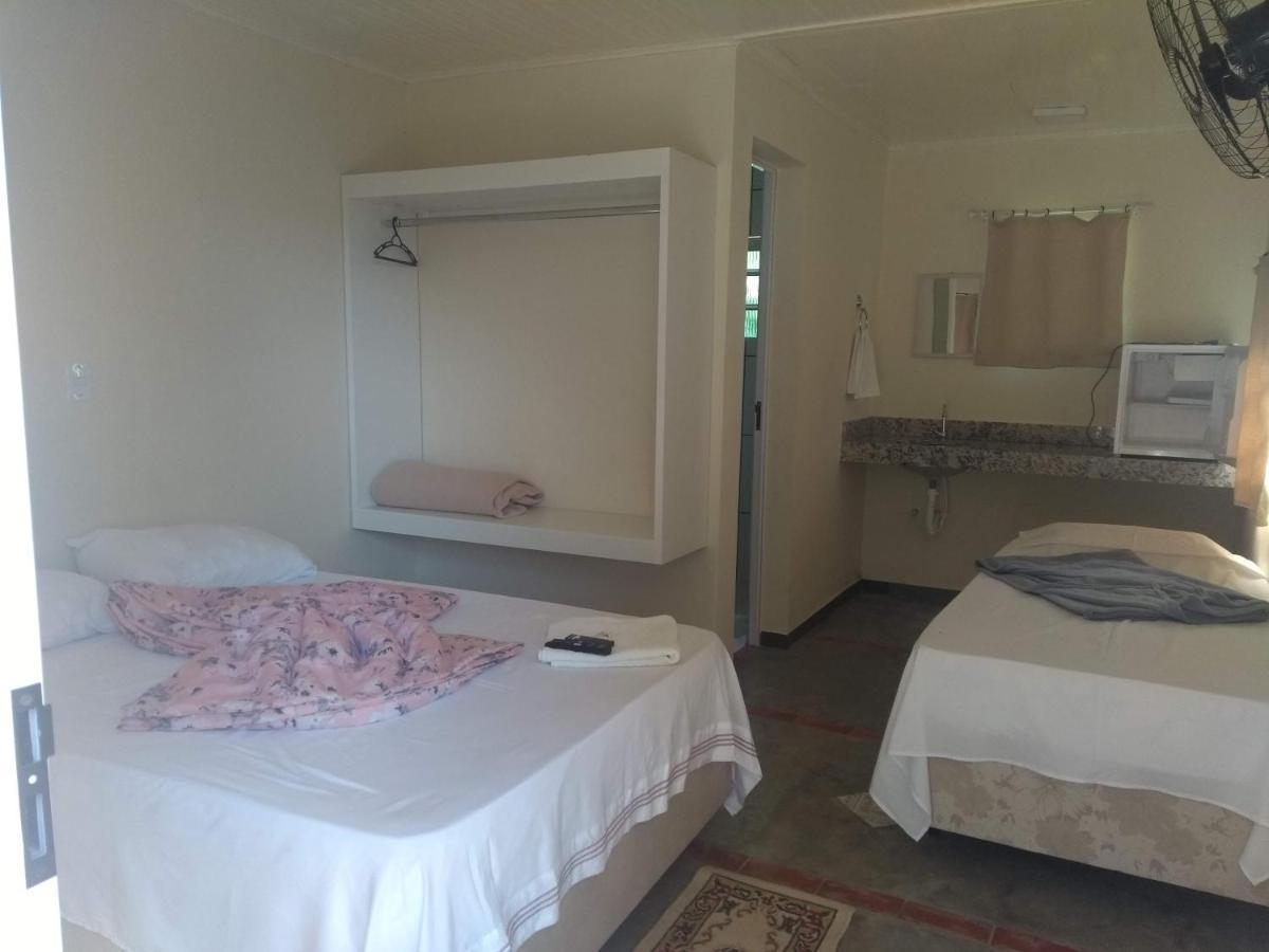 Quarto Triplo com Vista Piscina
