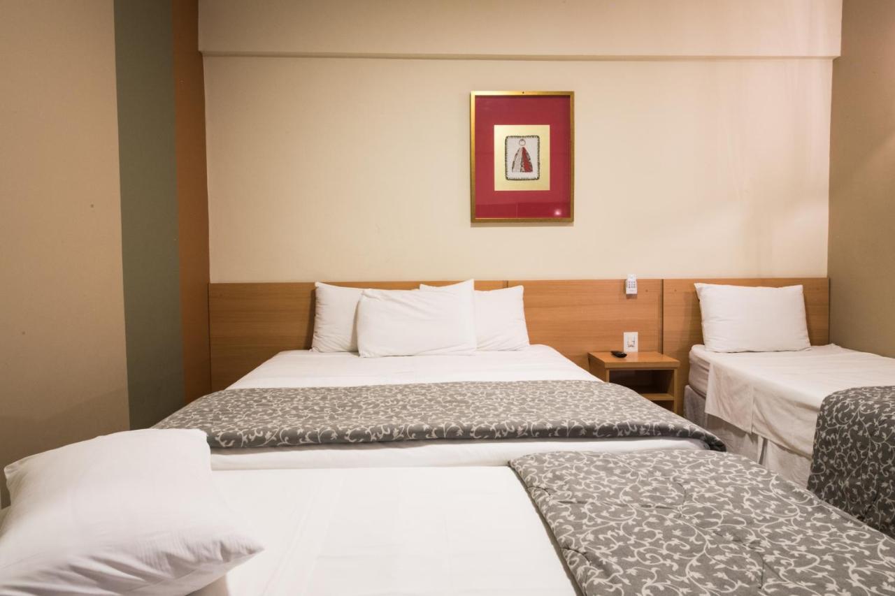 Quarto Quádruplo Luxo