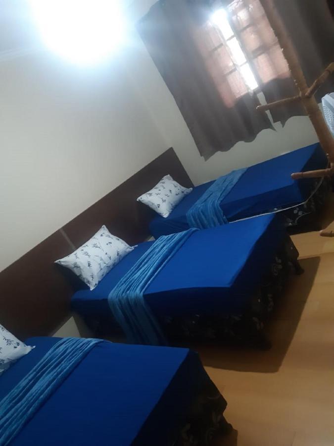 Quarto Triplo Económico com Casa de Banho Partilhada