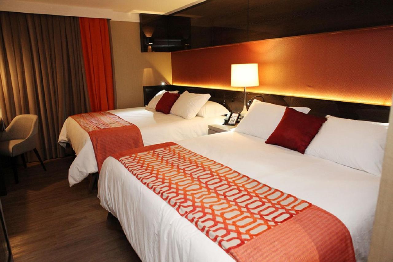 Quarto Quádruplo Luxo
