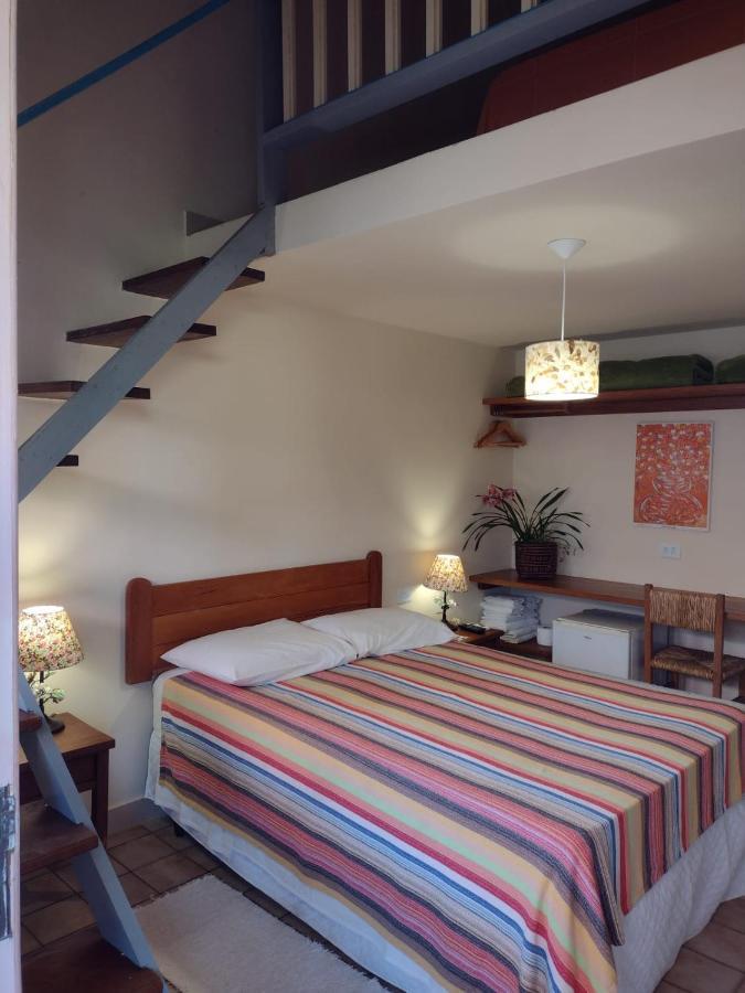 Quarto Quádruplo com Casa de Banho Privativa