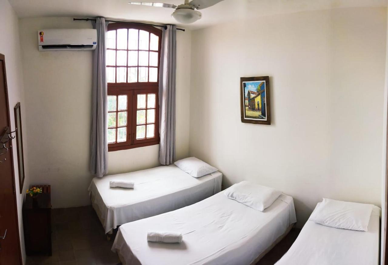 Quarto Triplo com Casa de Banho Privativa