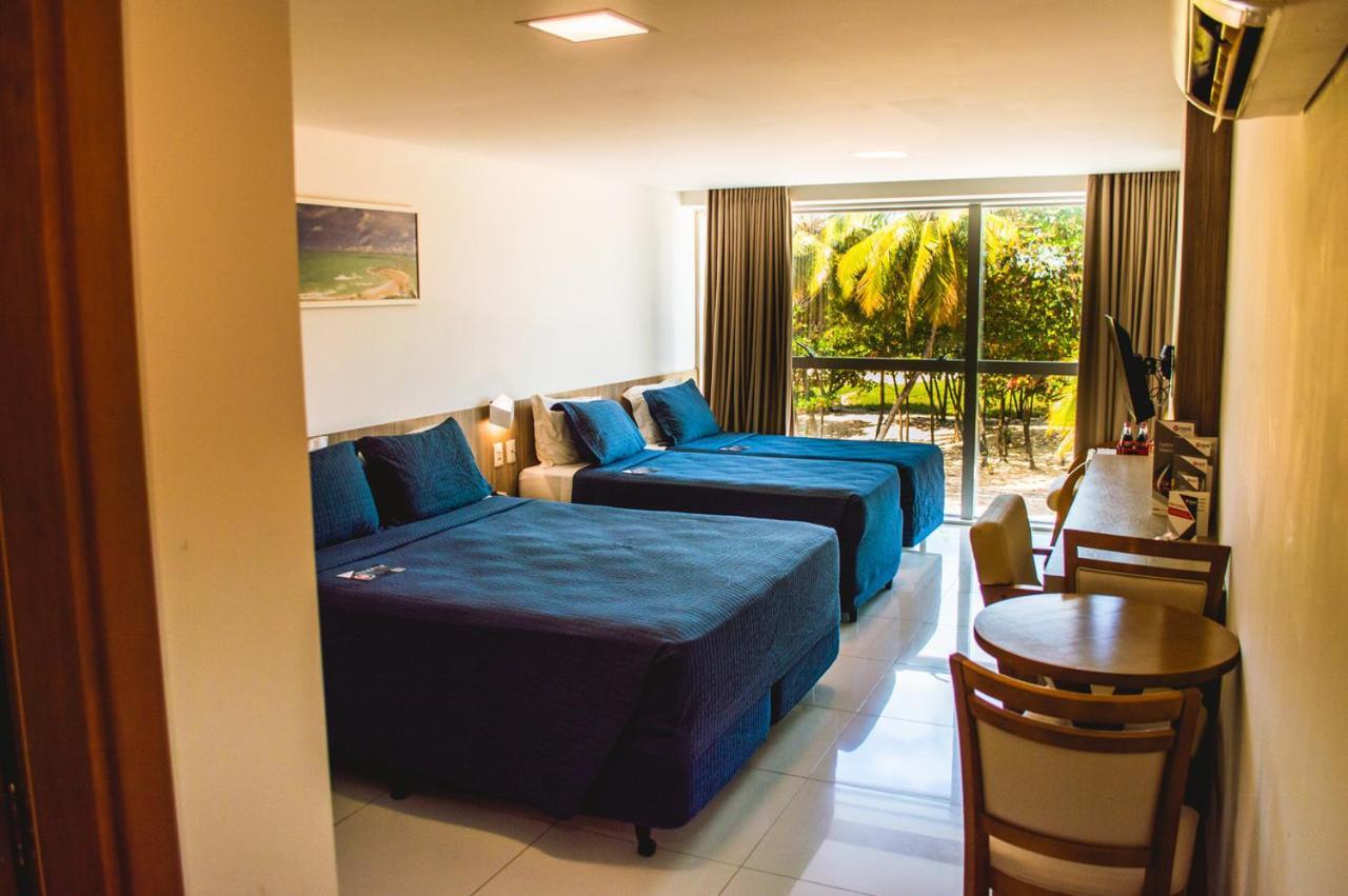 Quarto Quádruplo com Vista Mar