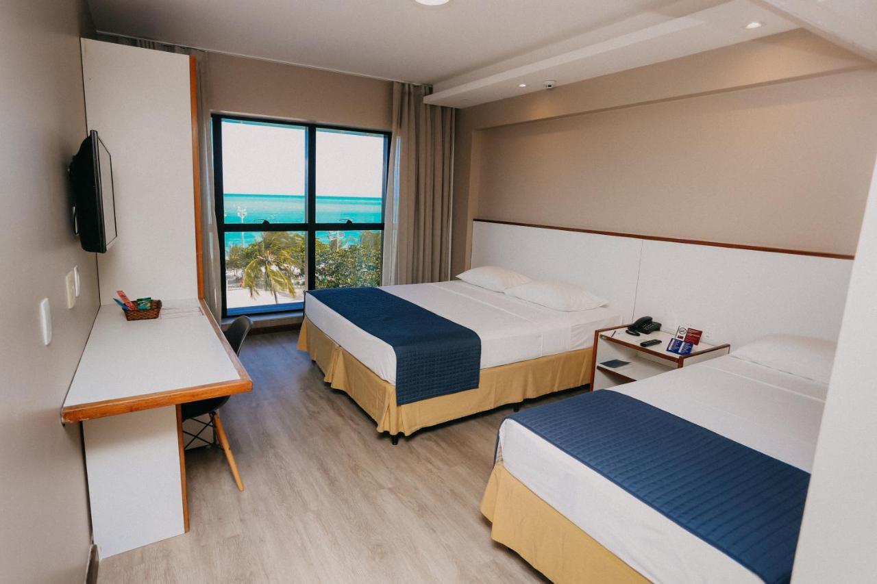 Habitación Triple Deluxe con vistas al mar