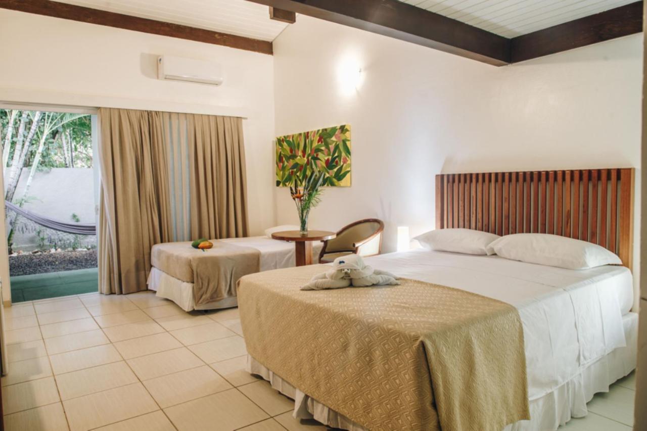 Quarto Deluxe (2 Adultos + 1 Criança)