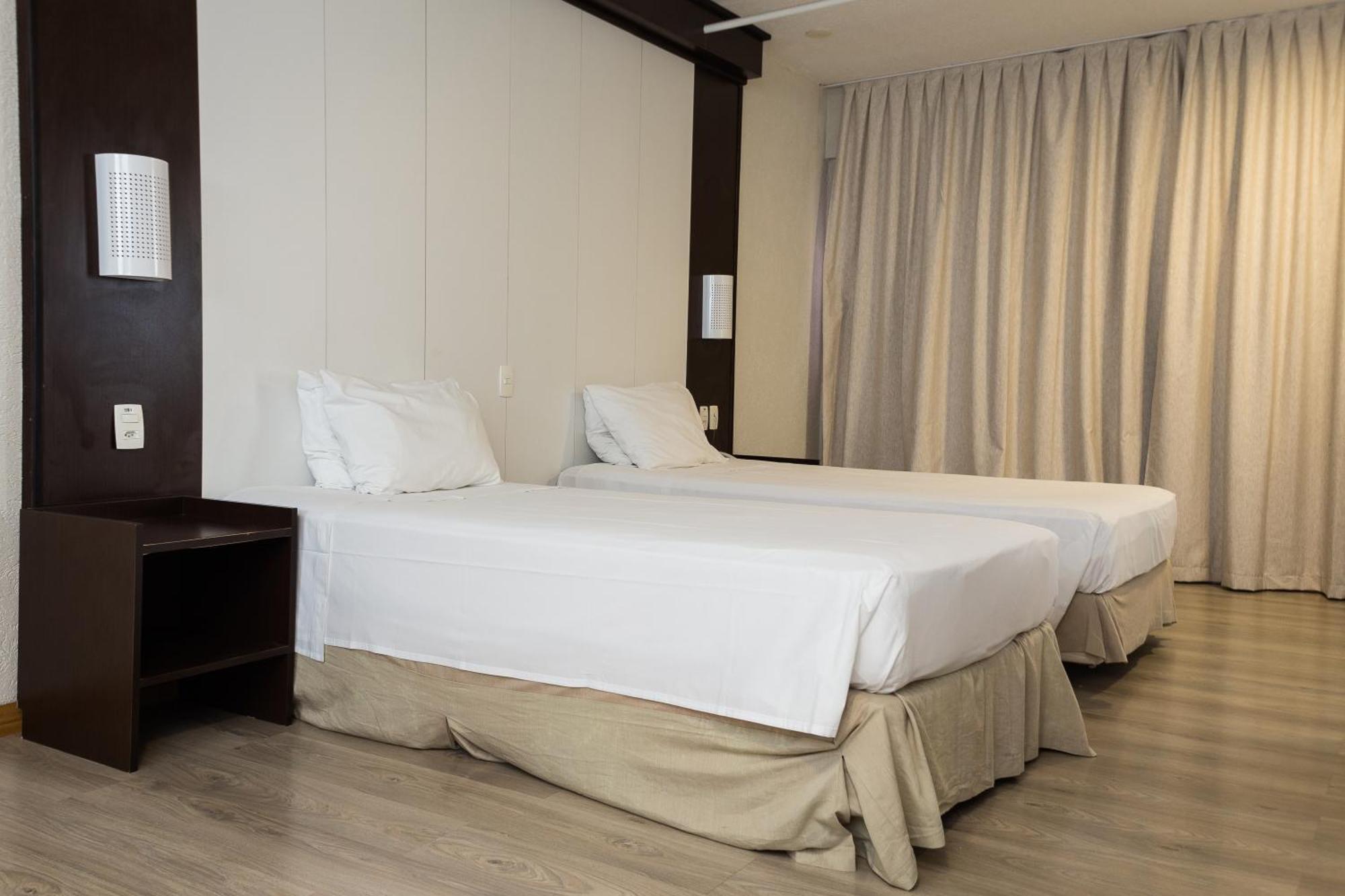 Quarto Clássico com 2 Camas Individuais