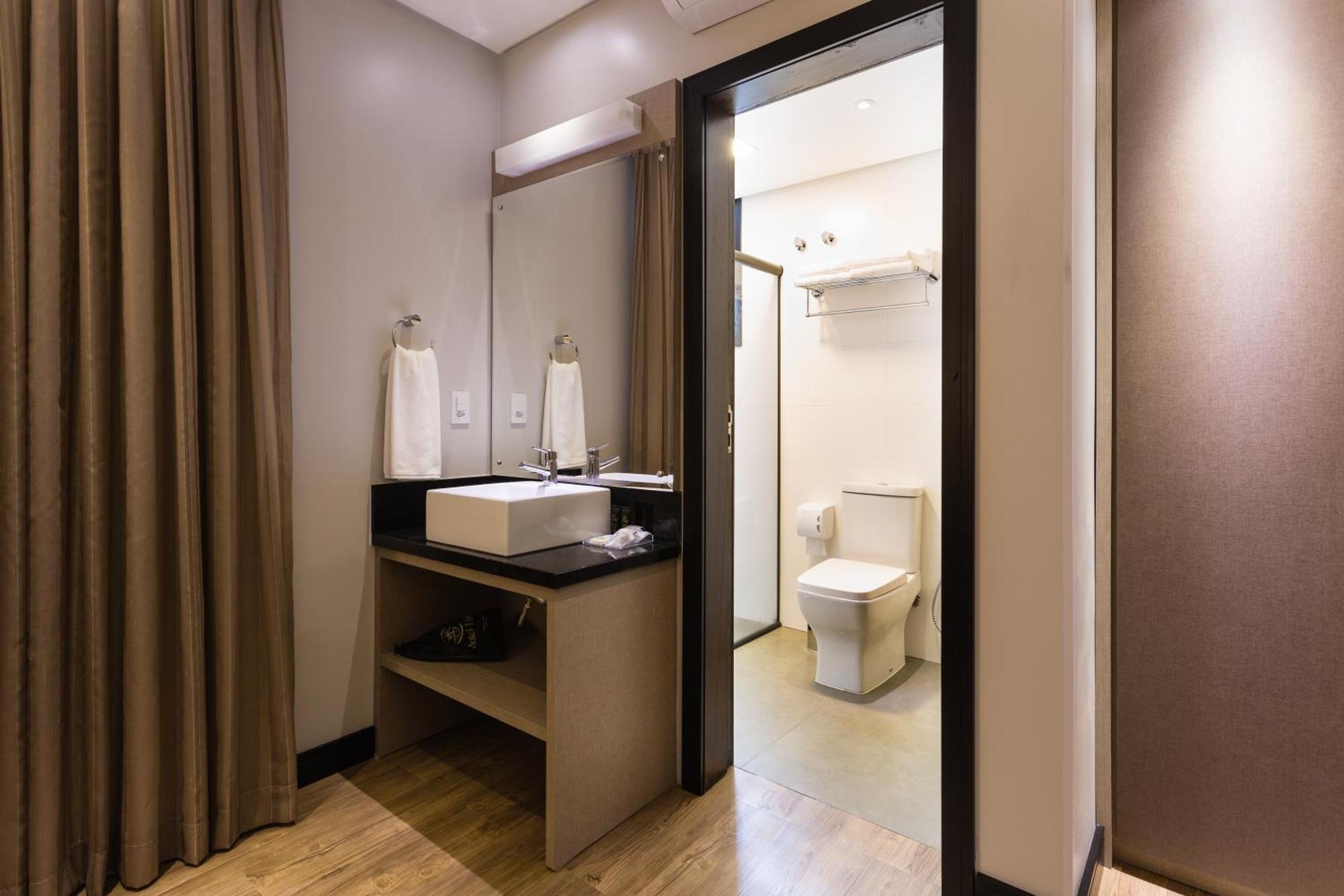 Suite Tripla Premium com Cama de Casal