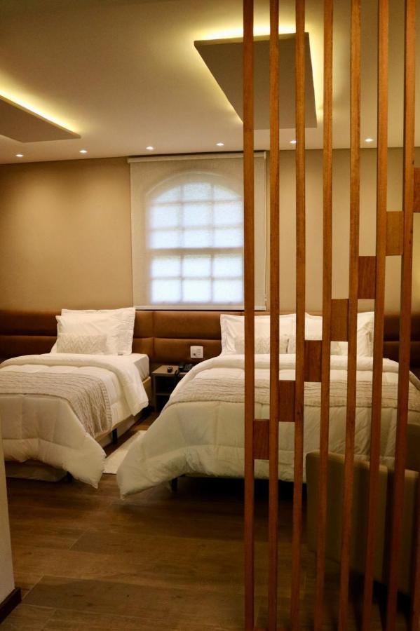 Quarto Quádruplo Luxo