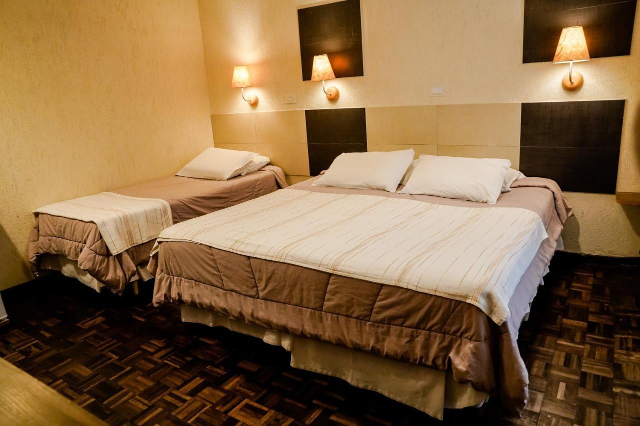 Quarto Triplo com Varanda