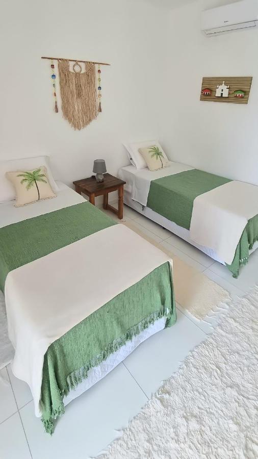 Quarto Triplo com Vista Piscina