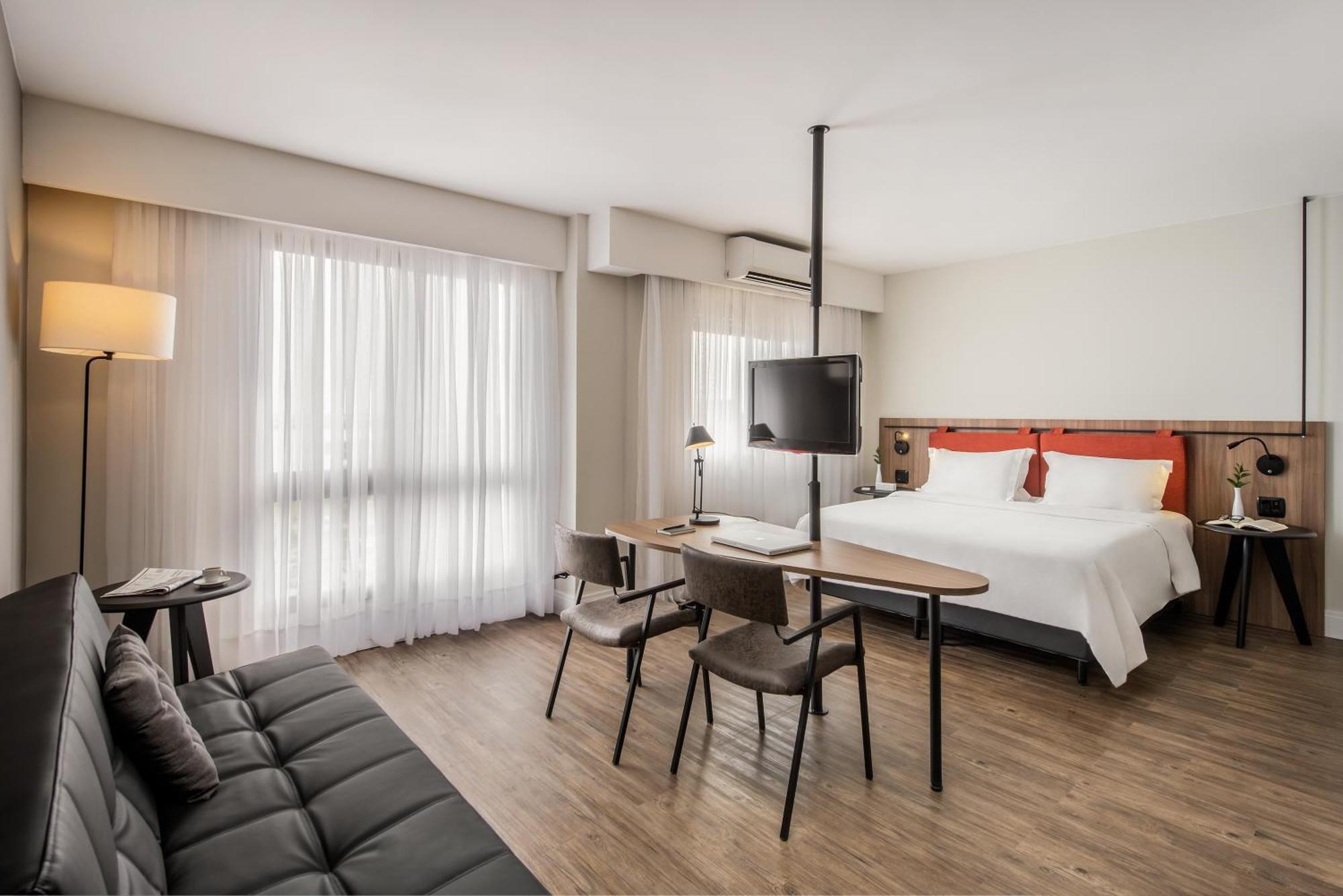 Premium Double - 1 King Bed and 1 Sofa Bed