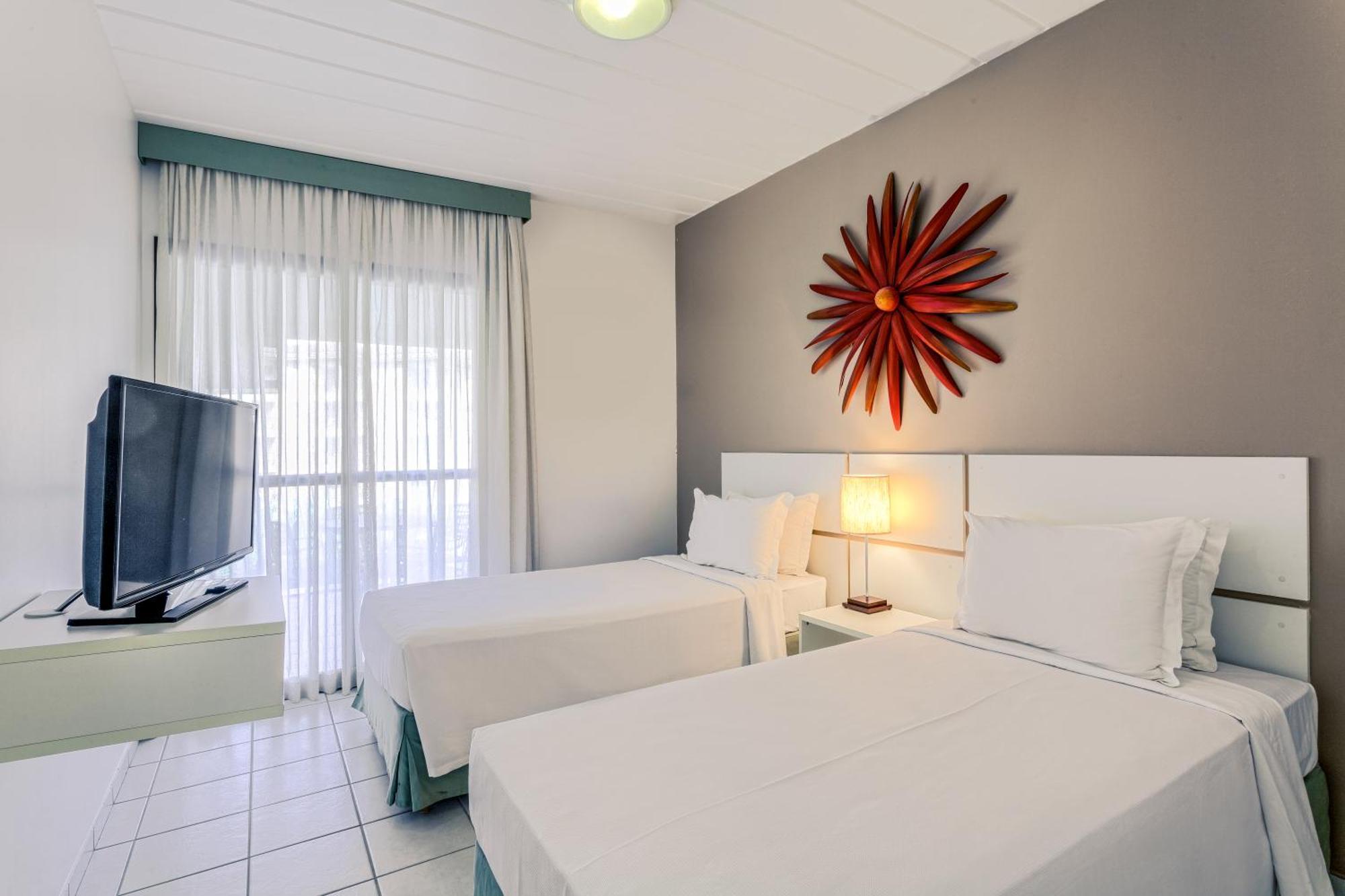 Suite Superior com 2 Camas Individuais e Sofá-cama