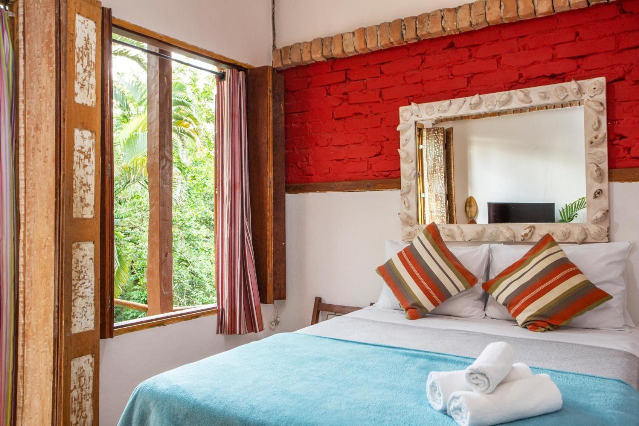 Suite com Vista do Jardim