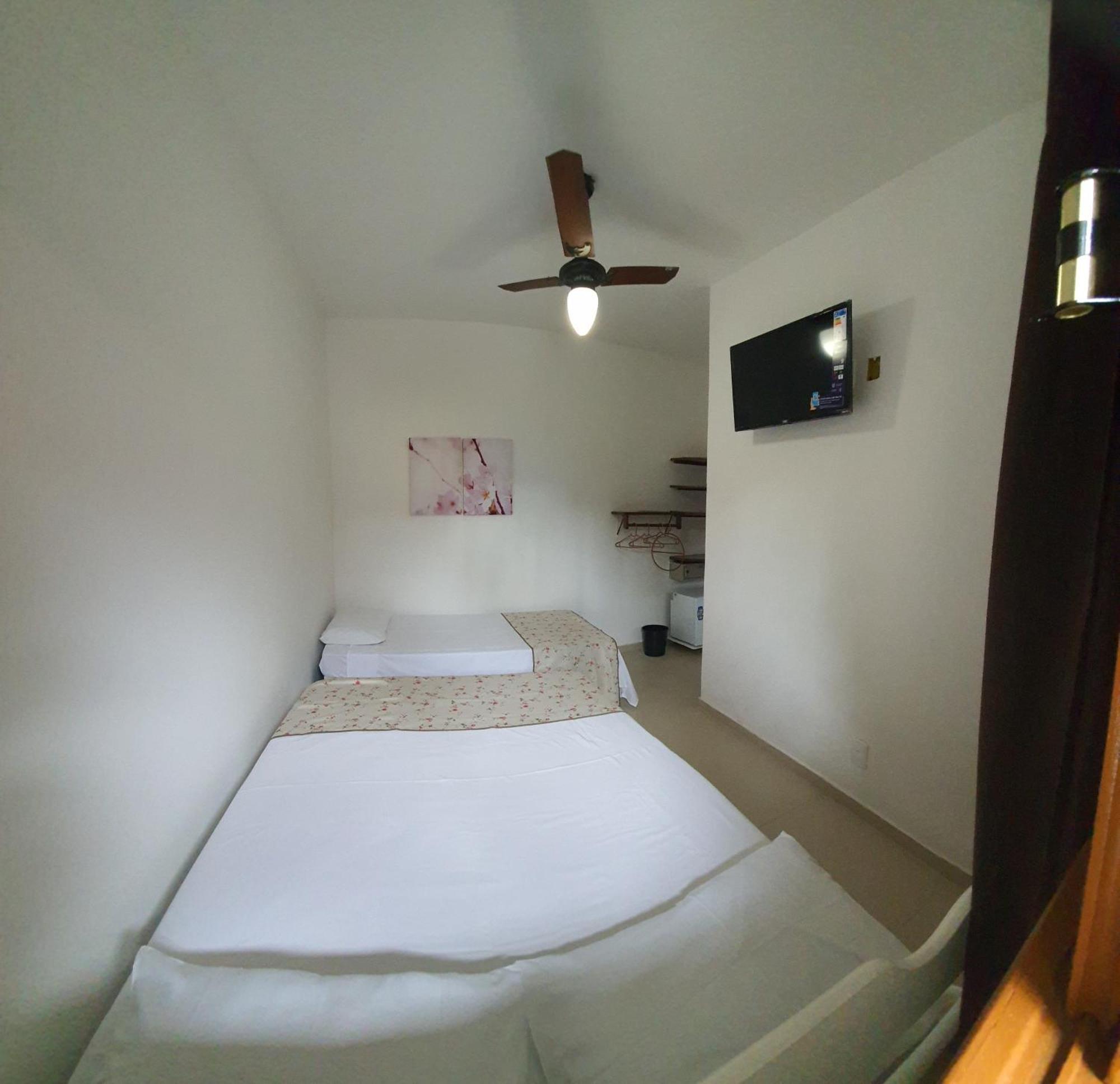 Quarto Triplo com Casa de Banho Privativa