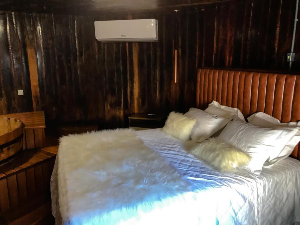 Quarto Triplo com Banheira