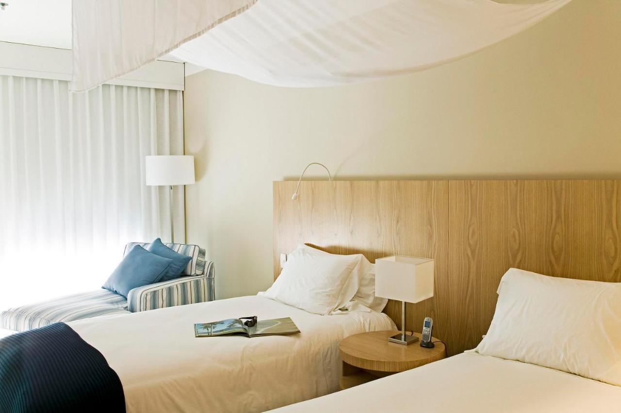 Quarto Twin Clássico com Varanda