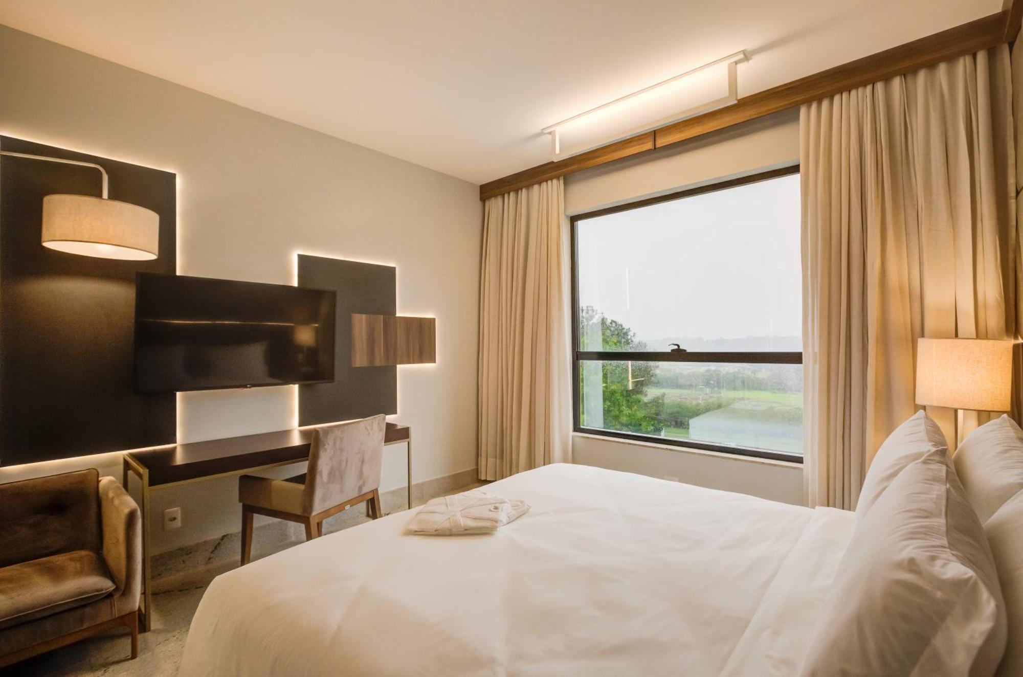 Quarto Deluxe com Vista Piscina