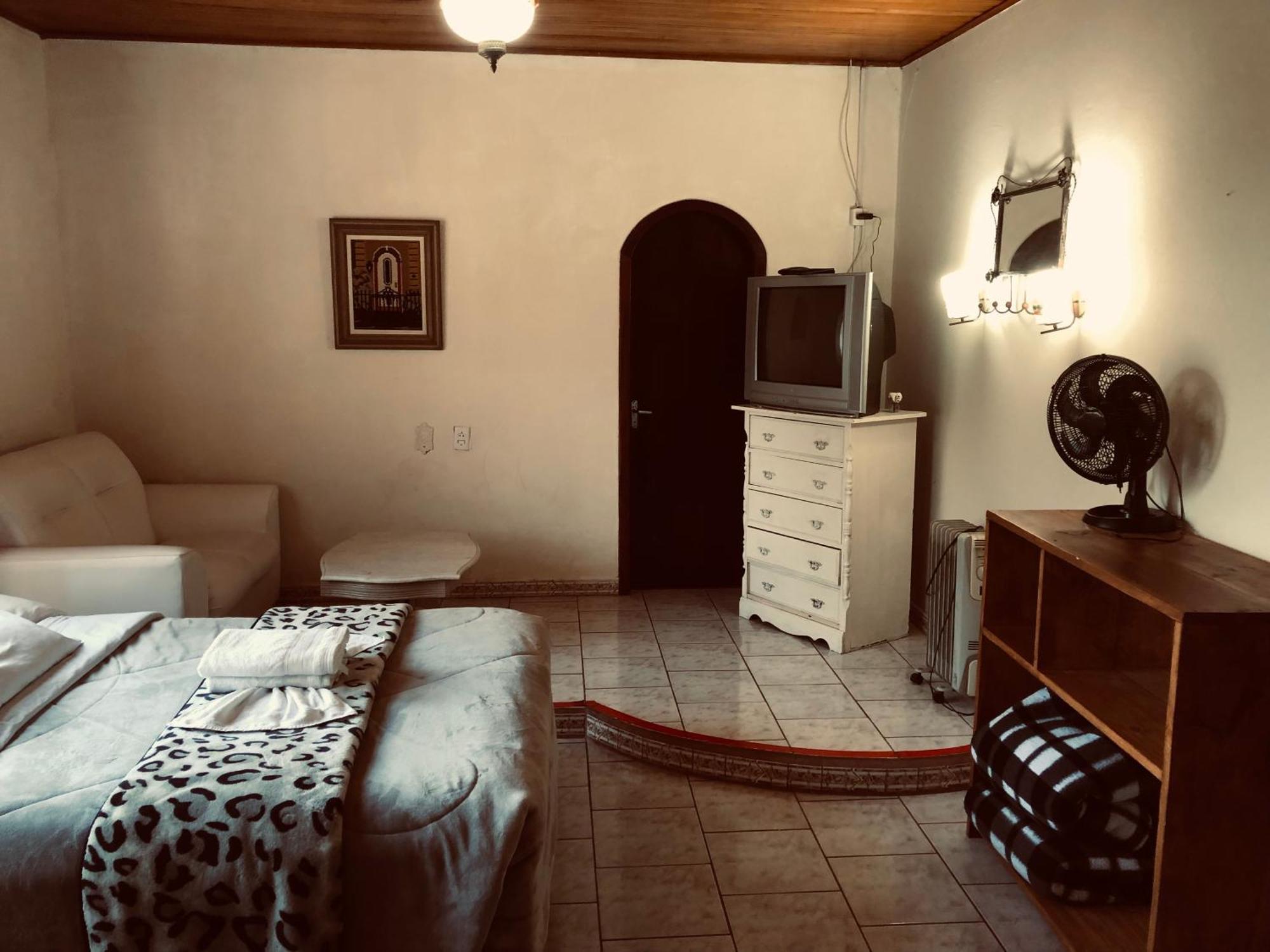 Quarto Quádruplo com Casa de Banho Privativa