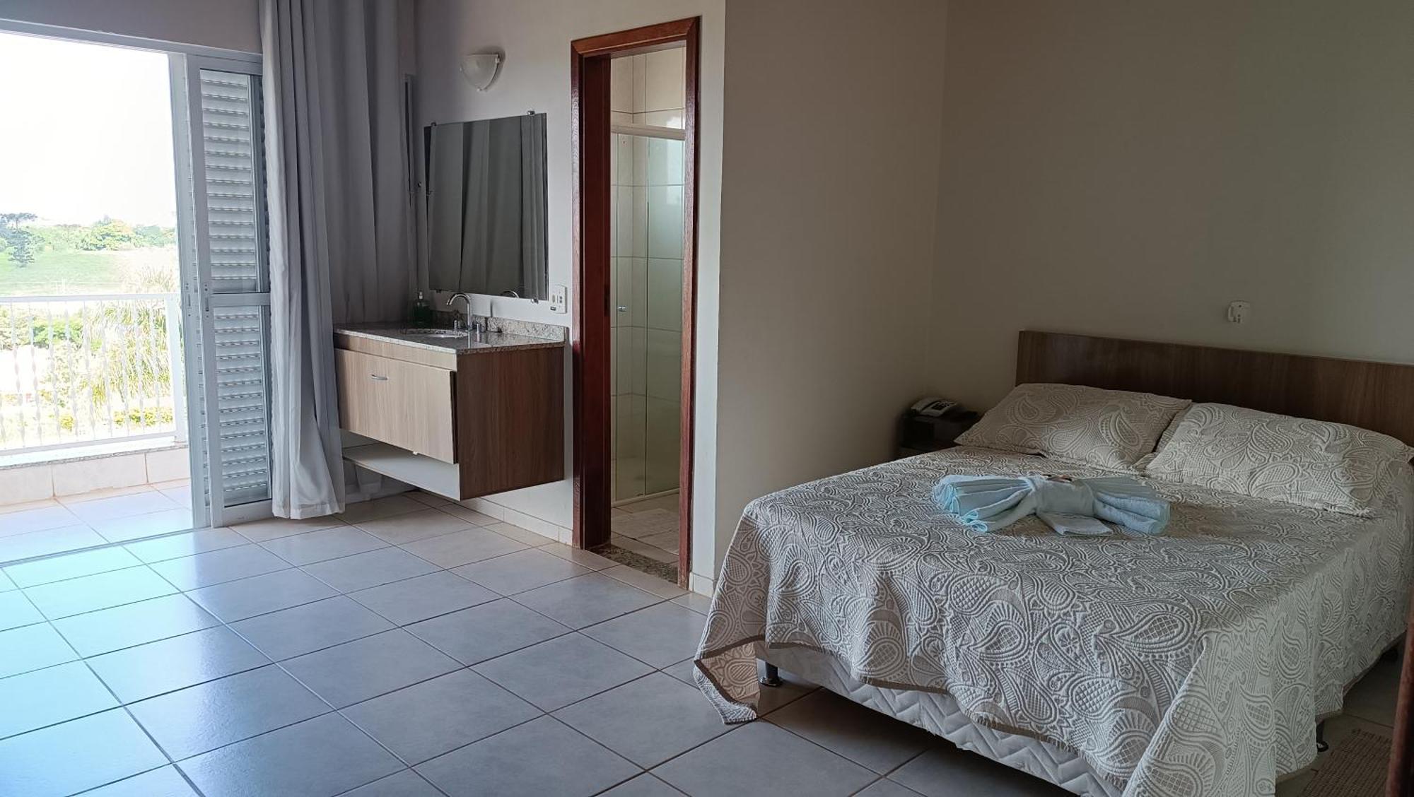 Suite com Varanda