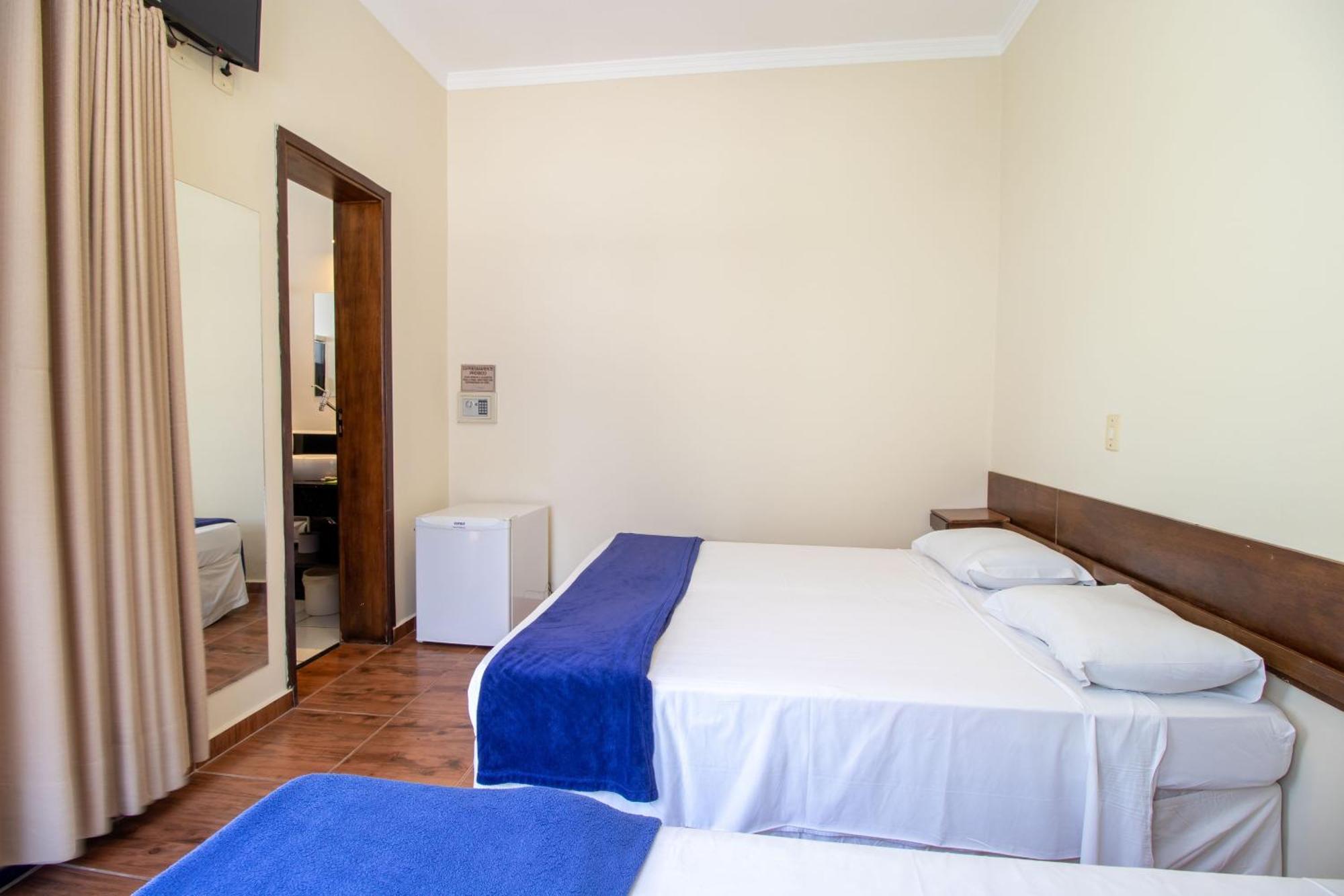 Quarto Triplo com Varanda