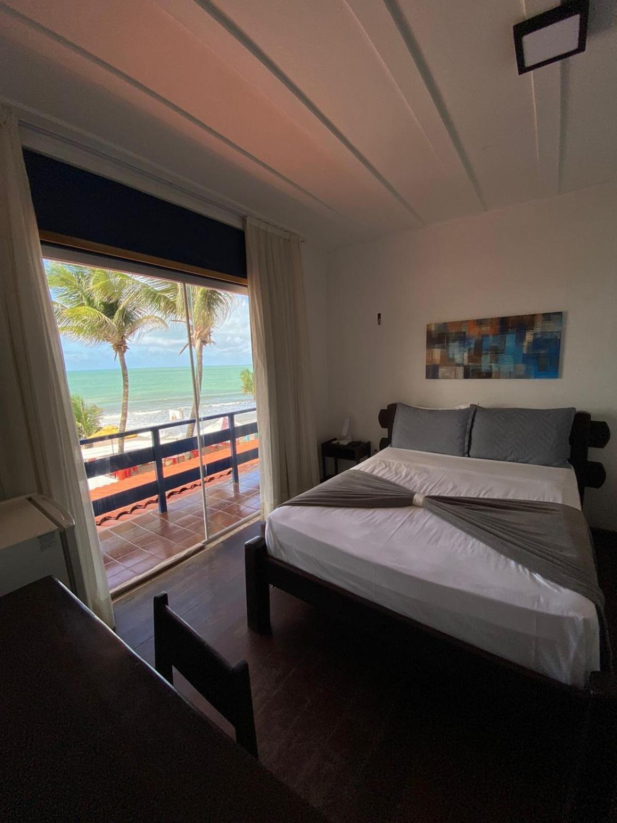 Quarto Triplo Deluxe com Vista Mar