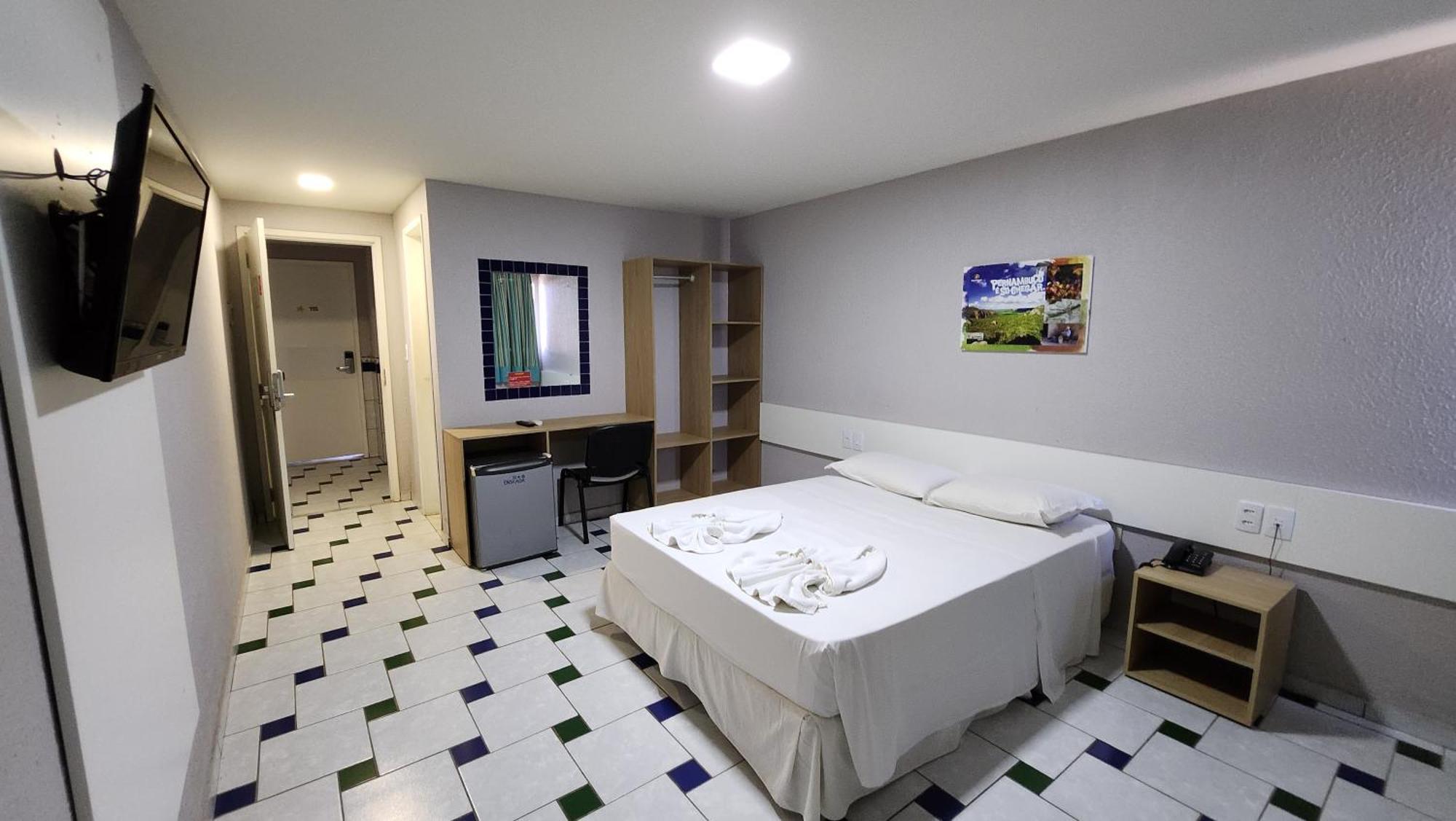 Quarto Duplo com Pátio