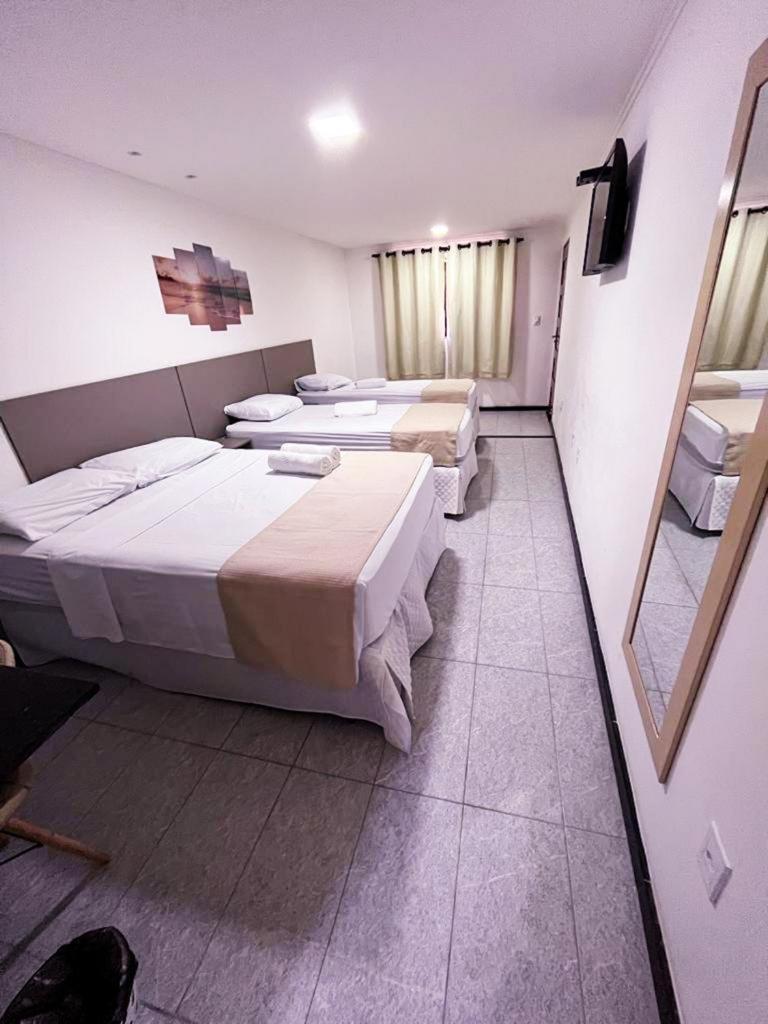 Quarto Quádruplo com Vista Mar