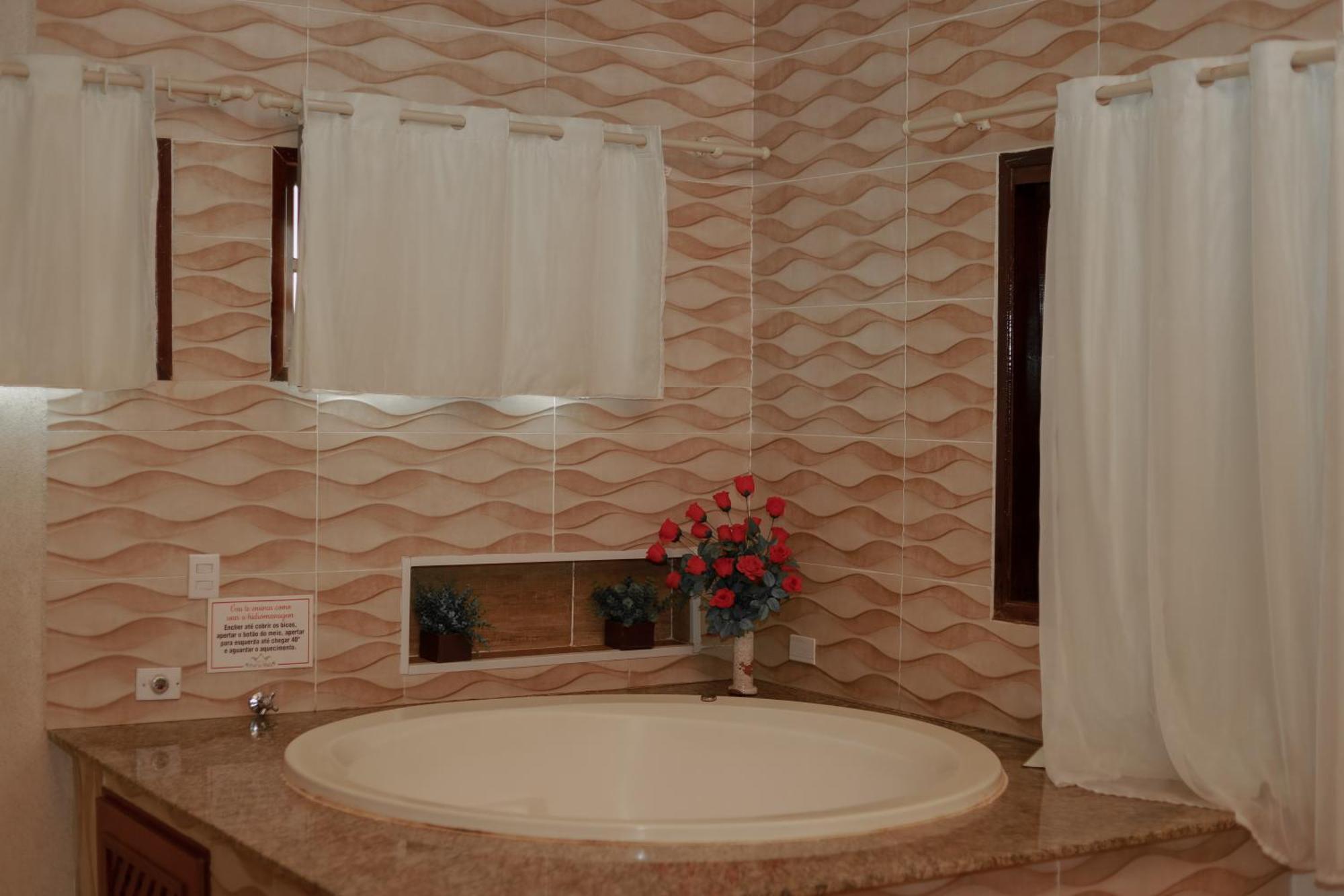 Suite Deluxe com Banheira de Hidromassagem