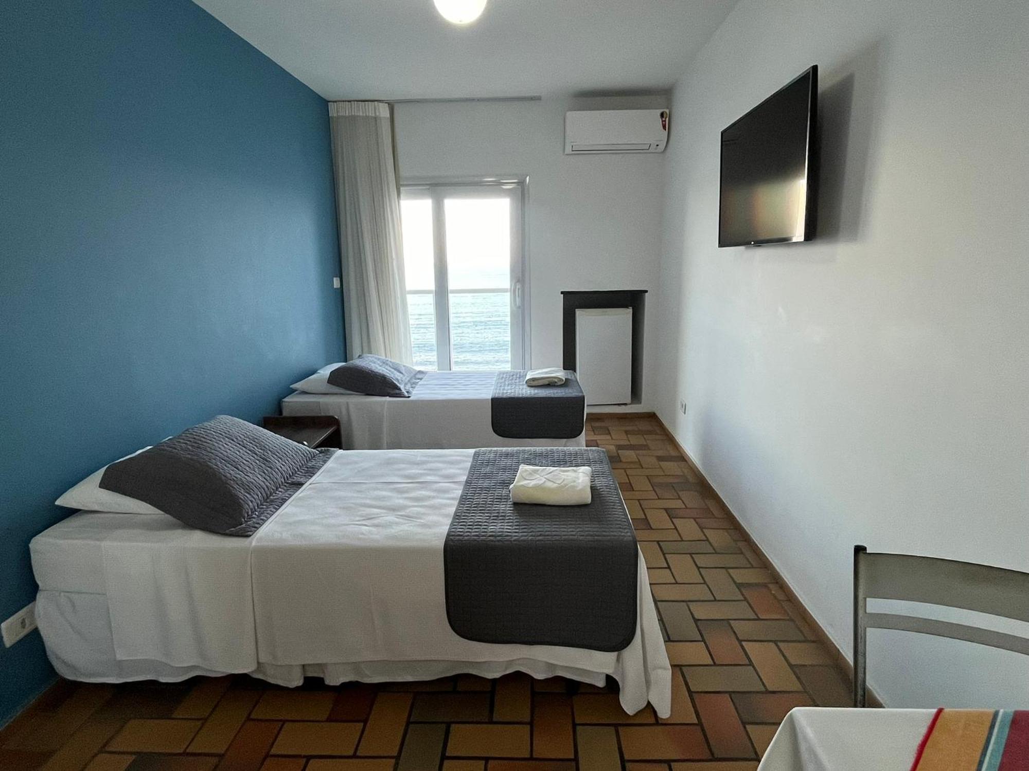 Quarto Quádruplo com Vista Mar