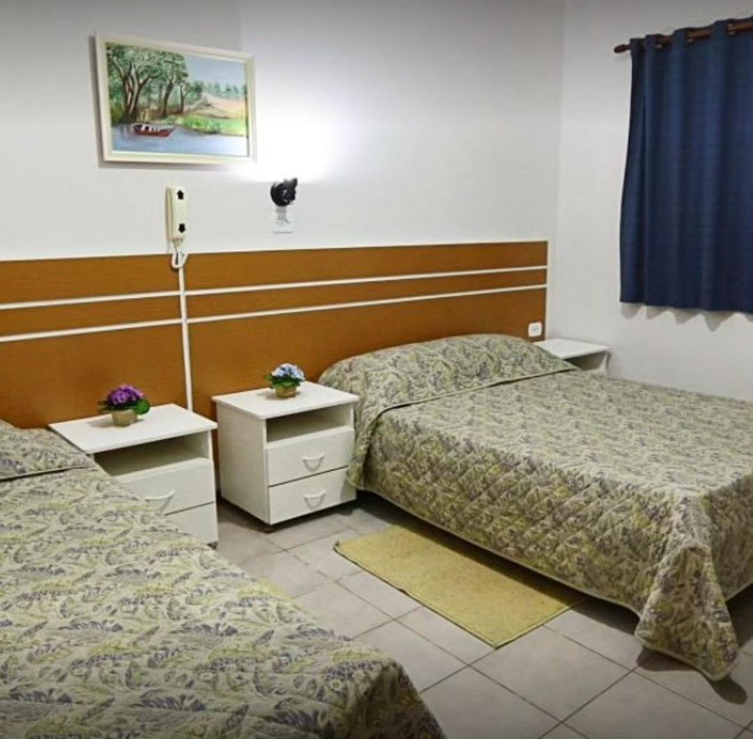 Quarto Triplo com Ar Condicionado