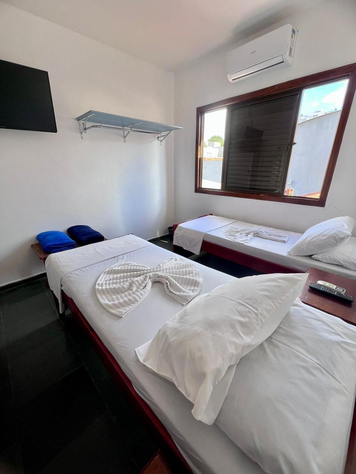 Quarto Duplo com Banheiro Compartilhado