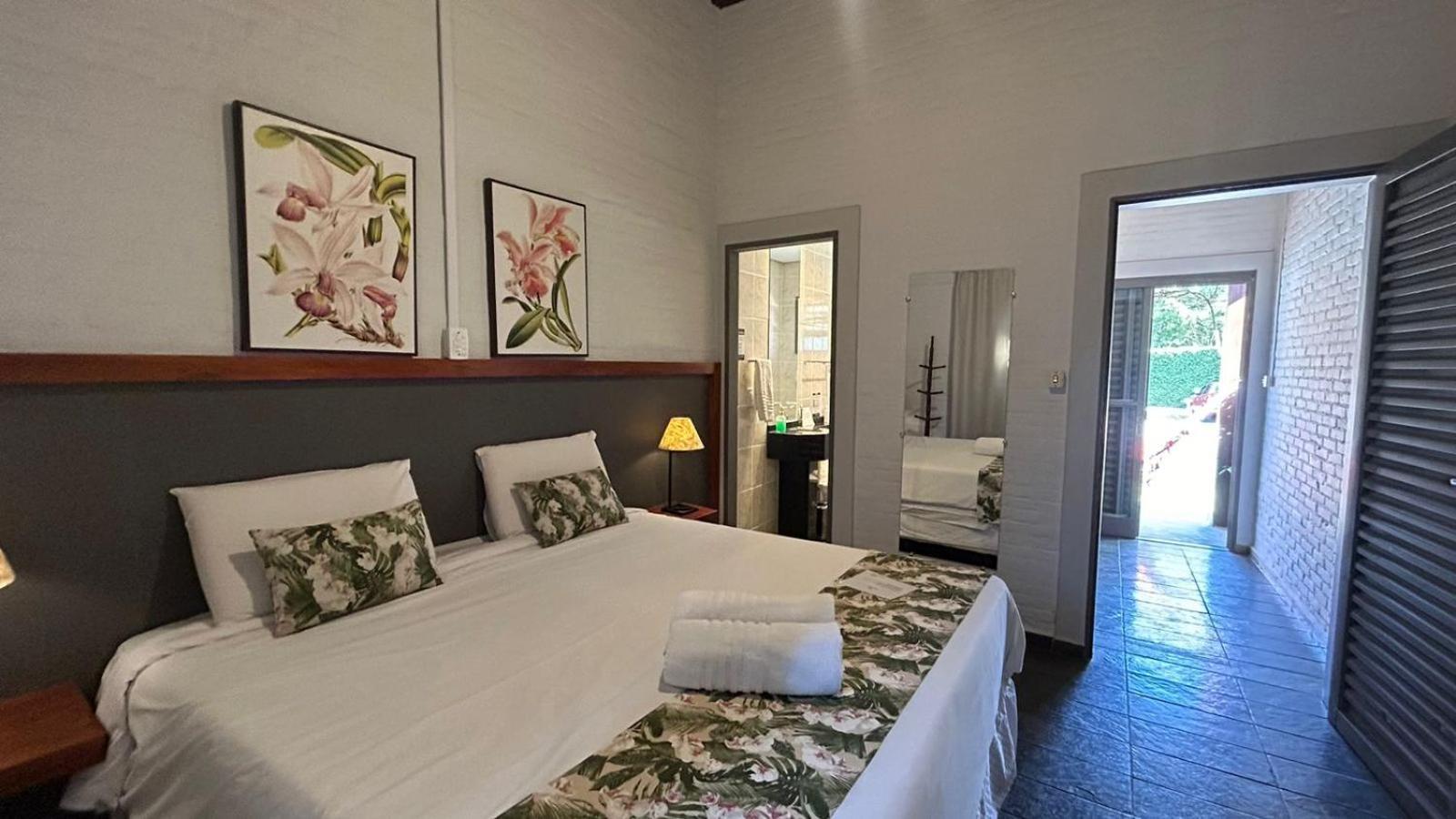 Quarto Quádruplo com Vista Jardim