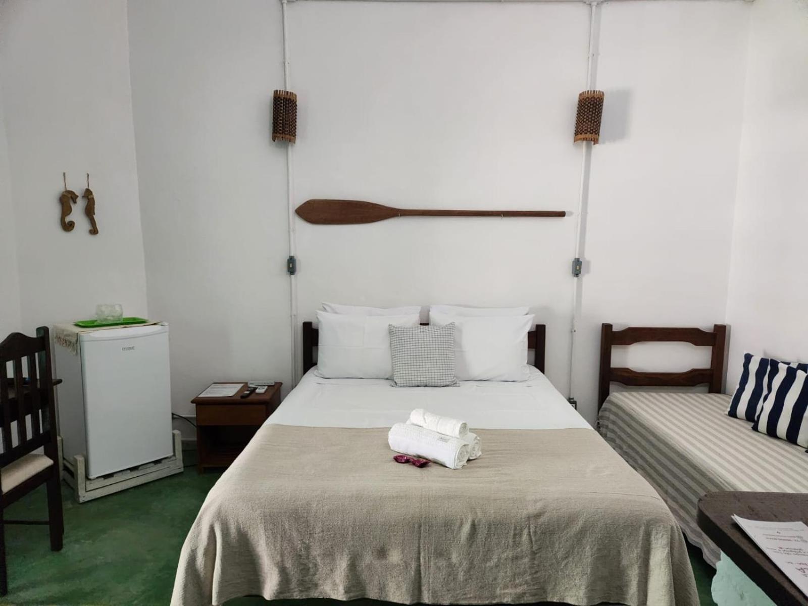 Quarto Triplo com Vista Mar