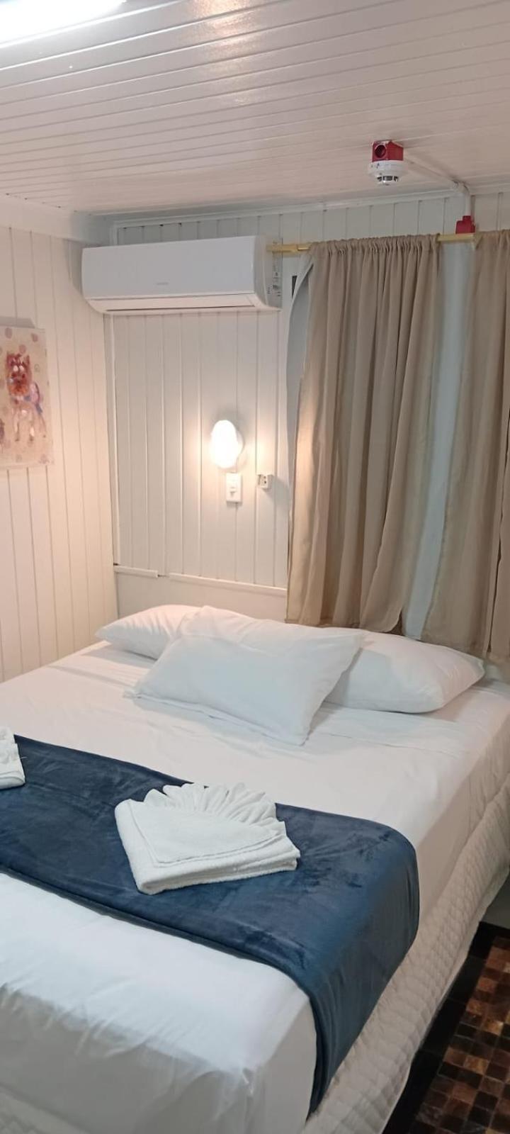 Quarto Familiar com Vista Mar