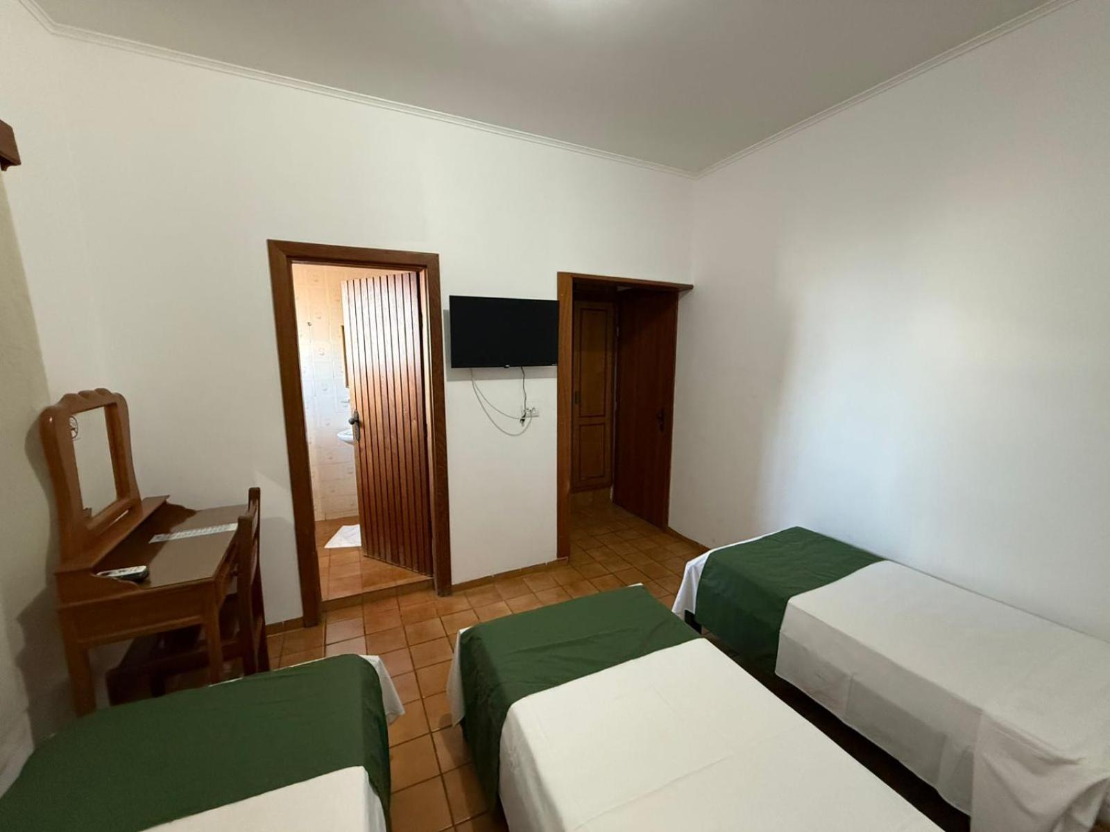 Quarto Twin com Cama Extra