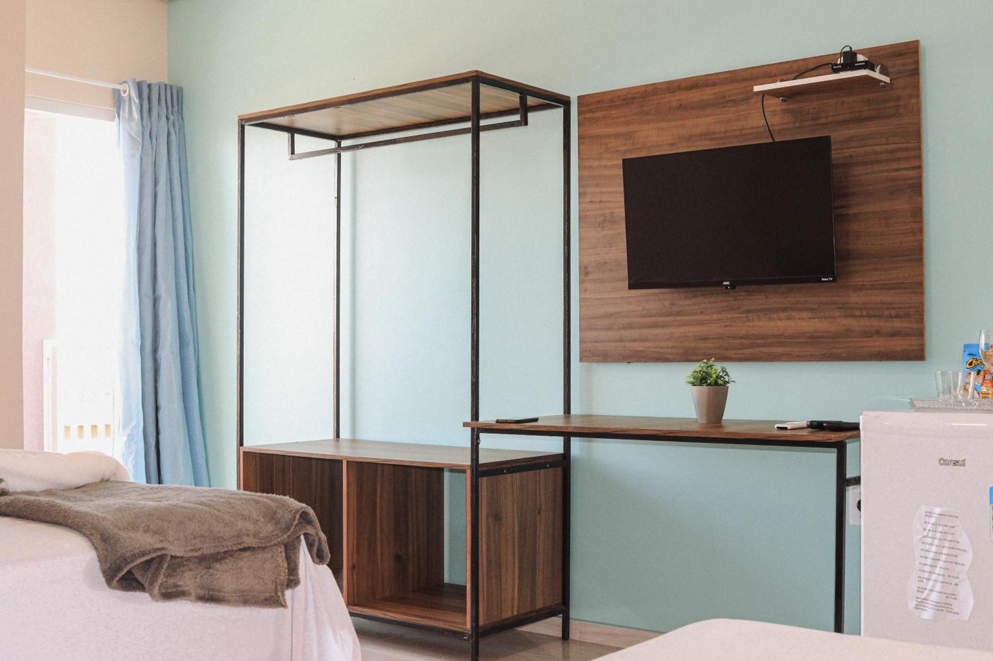 Quarto Deluxe (2 Adultos + 1 Criança)