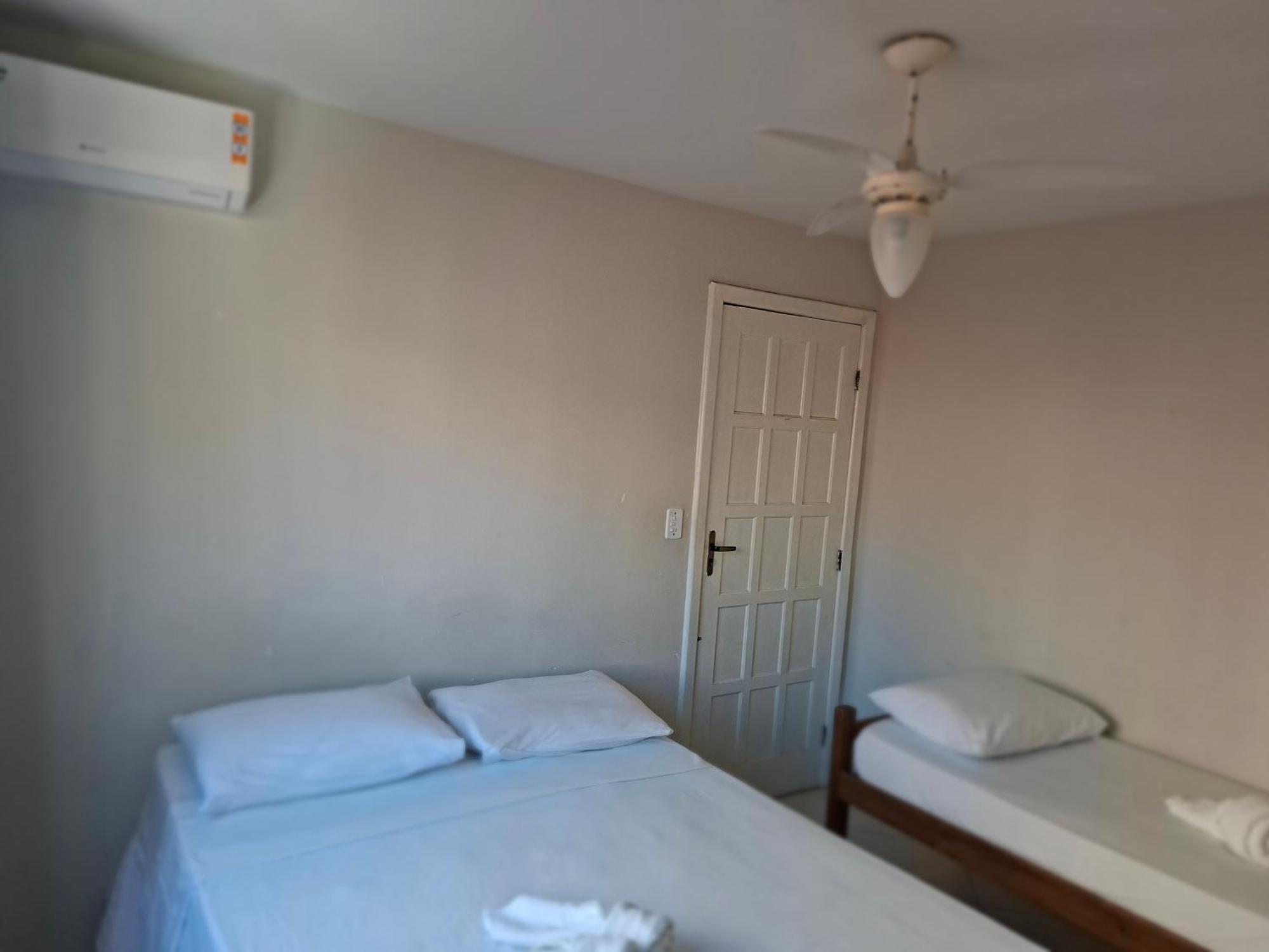 Quarto Triplo com Casa de Banho Privativa