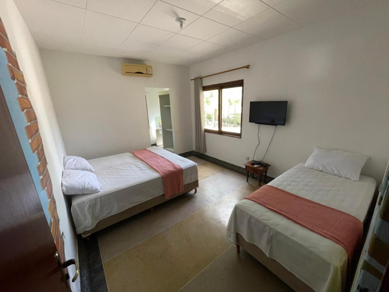 Quarto Triplo com Vista do Jardim