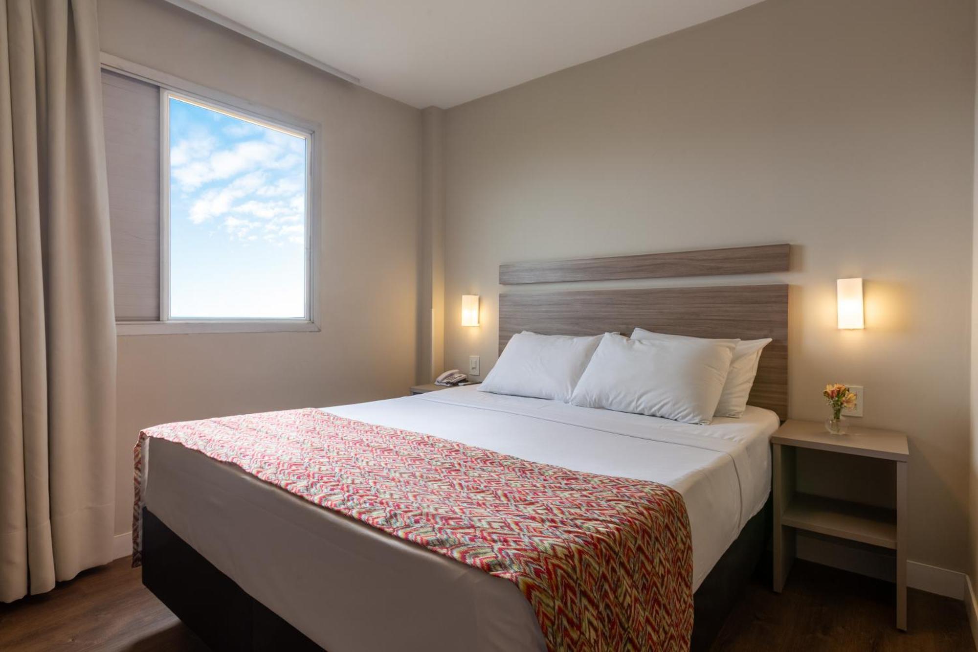 Quarto Triplo Deluxe com Vista Mar