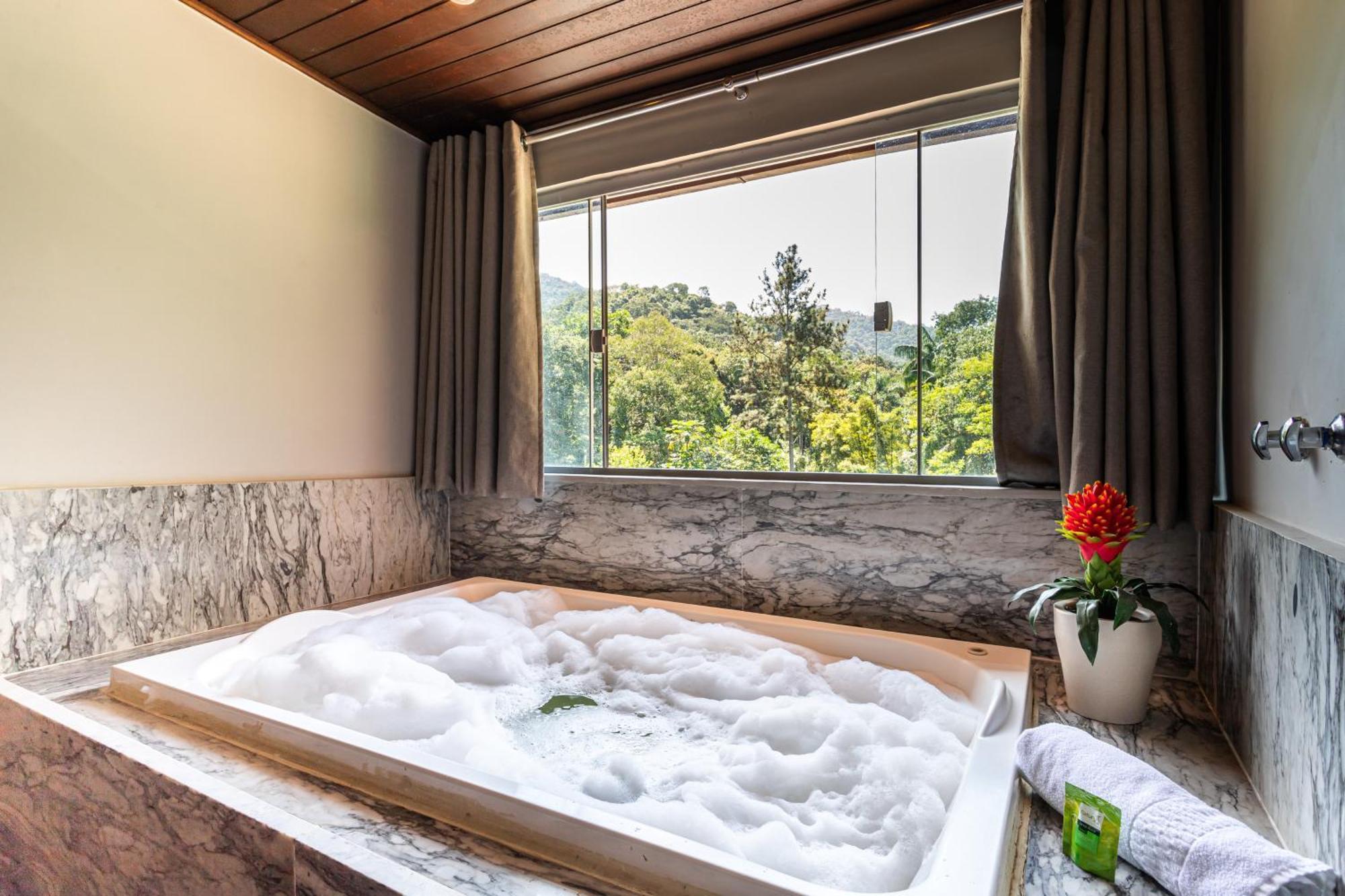 Suite com Banheira de Hidromassagem