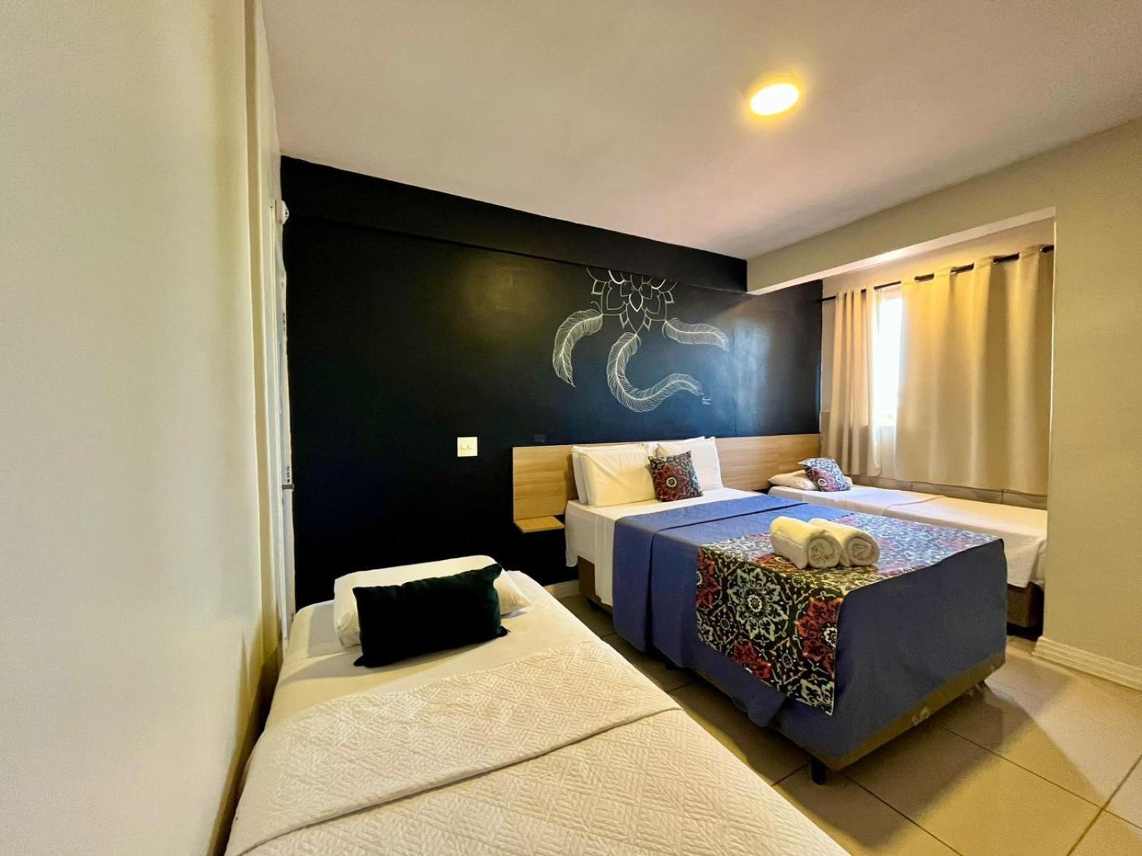 Quarto Quádruplo com Vista Mar