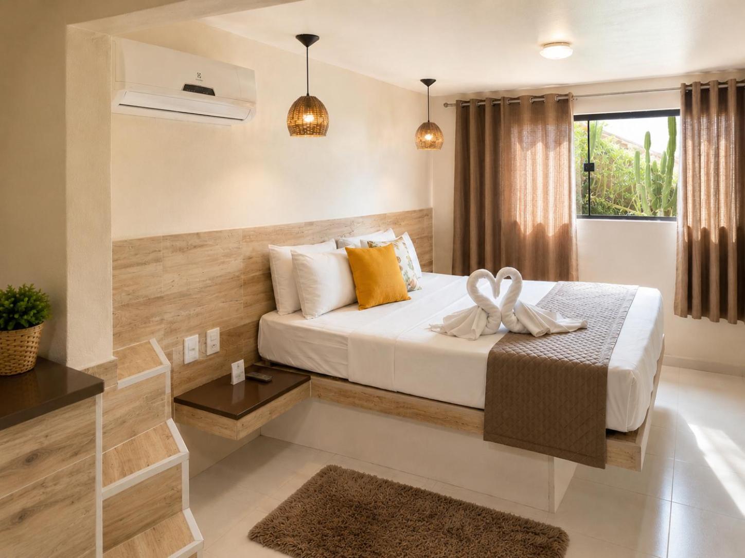 Quarto Queen com Vista Jardim