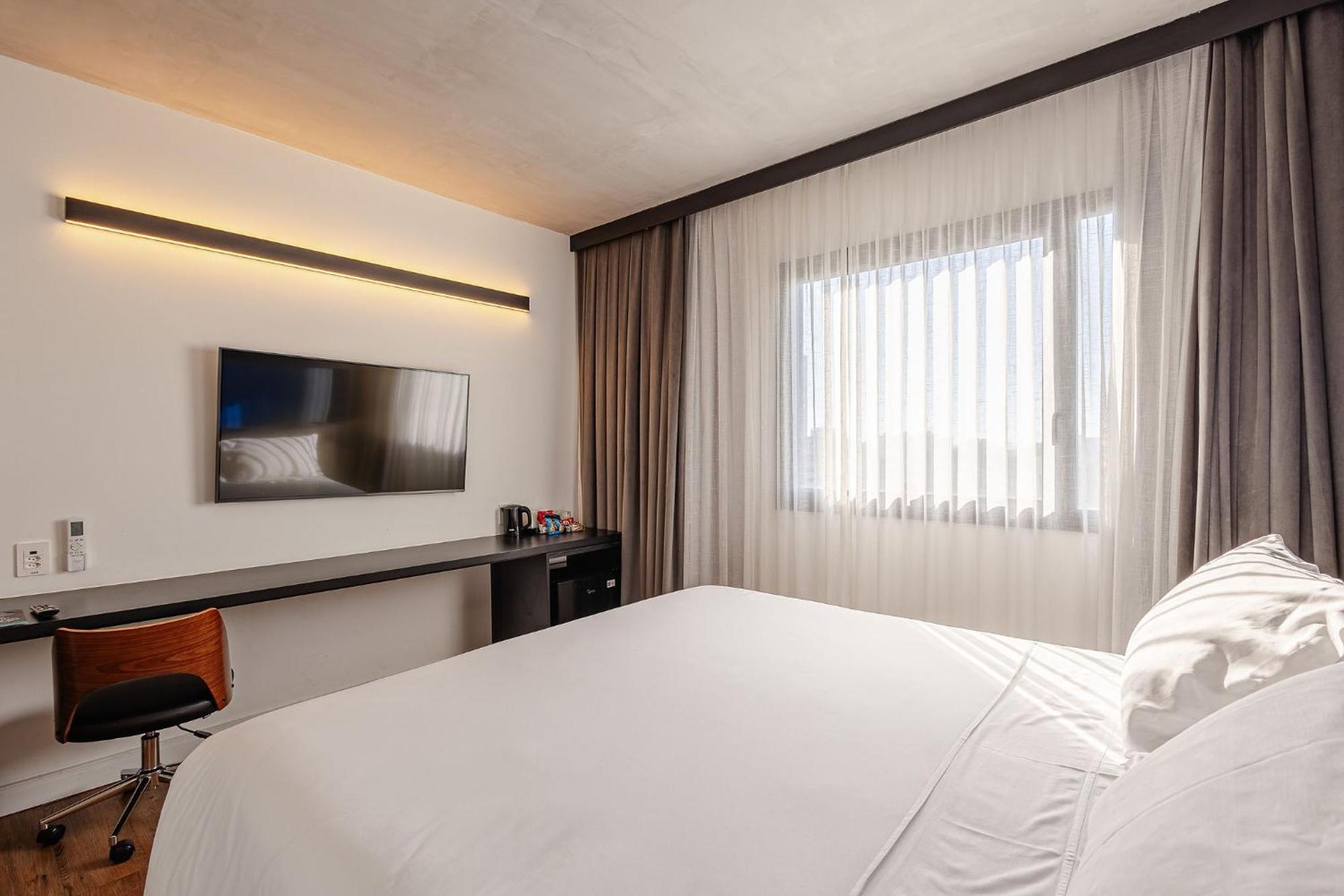 Quarto Queen Deluxe
