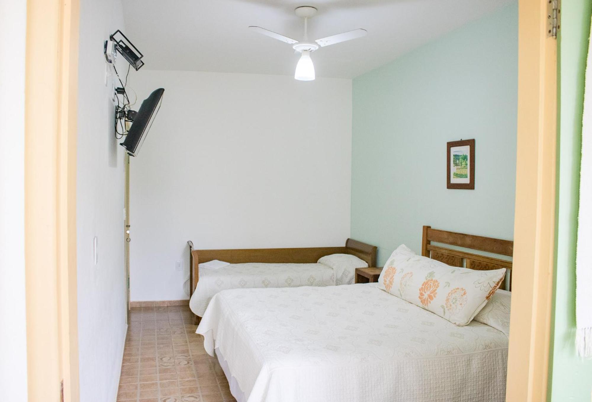 Quarto Triplo com Casa de Banho Privativa
