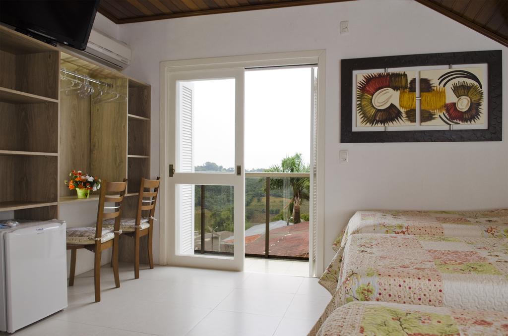 Suite com Varanda