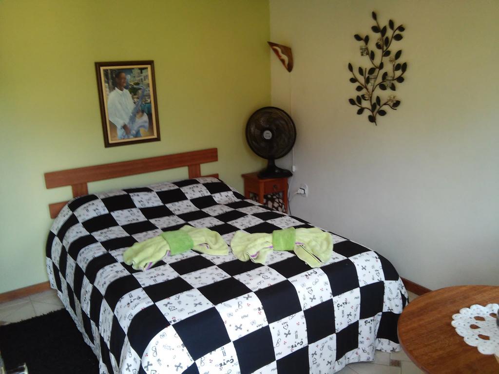 Quarto Triplo com Vista para a Montanha