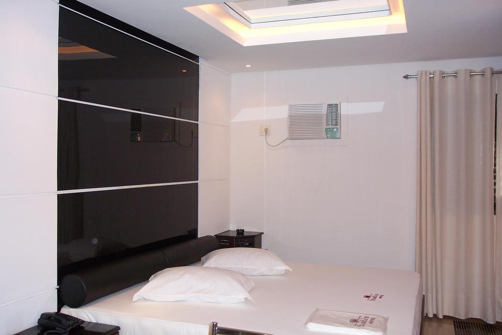 Suite King com Banheira de Hidromassagem e Sauna