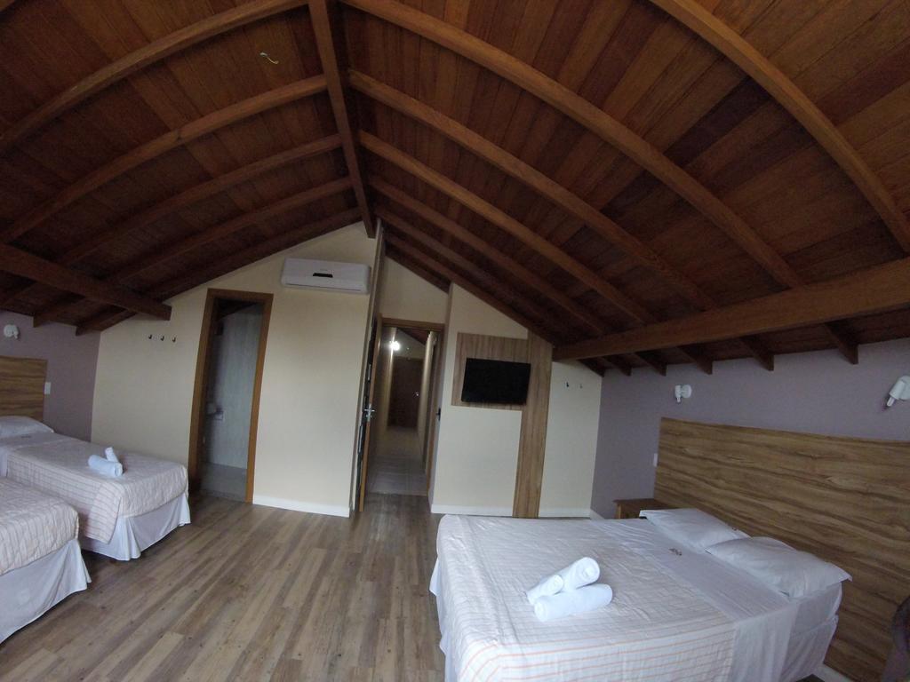 Quarto Quádruplo Luxo